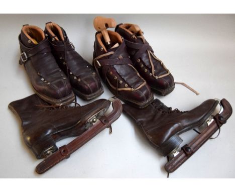 Two pairs of vintage leather Juppen, Dusseldorf, ski boots, one with Juppen wooden stretchers, size 9 and 11 together with a 