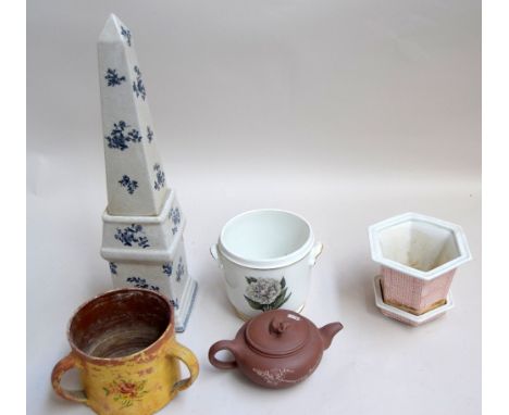 A selection of porcelain, to include two pots, a porcelain figurine in the shape of a pedestal, together with a ceramic jug d