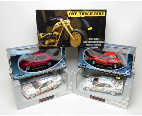 Boxed diecast scale model vehicles, by UT, Solido and RC2 Brand, including: a Caterpillar 1/10 scale model motorcycle; and tw