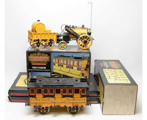 Hornby Railways Stephenson's Rocket 3 1/2in. gauge model train, tender, coach, track and points, G104 coach, G102 track and G