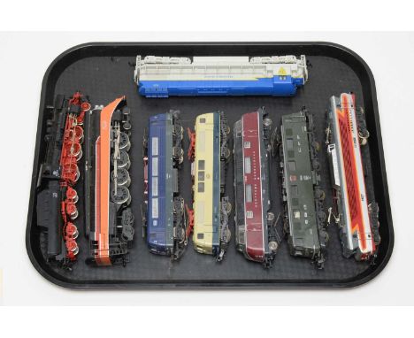 Eight unboxed locomotives and tenders, HO/00 gauge, makers include Bachmann and Lima, American and European outlines. 