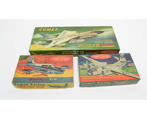 Three boxed Comet Series scale model kits, military and other aircraft.