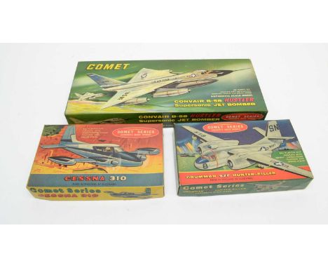 Three boxed Comet Series scale model kits, military and other aircraft.