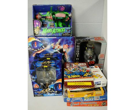 Various Sci-Fi action figures and collectors' items, including: Lost In Space Bubble Fighter, Rocket Launcher Robot, and Futu