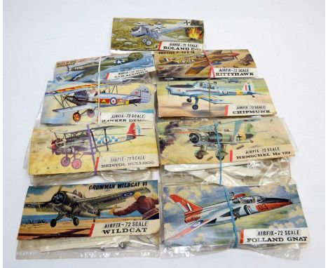 Nine early Airfix construction kits, Red Stripe, bagged, 1:72nd scale.