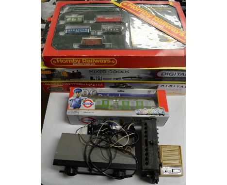 Three boxed Hornby 00-gauge trains sets, comprising: R1173 Western Master, R1075 mixed goods set, R570 Freightmaster; togethe