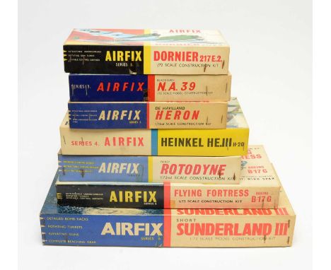 Seven boxed Airfix model construction kits, yellow, blue and red stripes, military and commercial aircraft, 1:72nd scale.