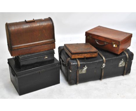 A trunk, a suitcase, a deed box, sewing machine and some drill bits (5).