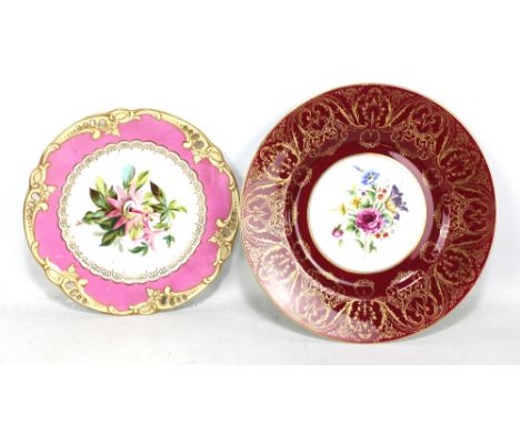 A Royal Worcester floral decorated cabinet plate and a similar smaller plate (2). 