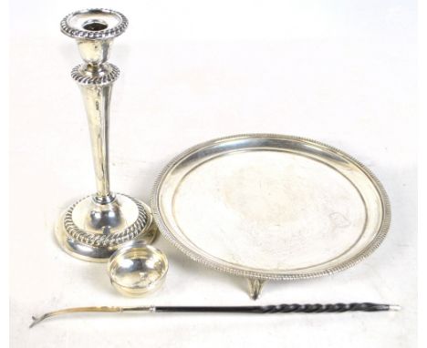 THOMAS BRADBURY &amp; SONS; a George V hallmarked silver circular salver with cast rim, on three outswept supports, Sheffield