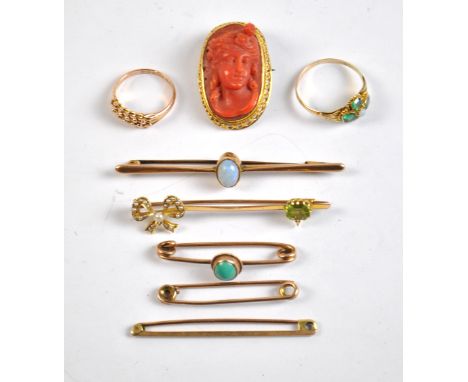 Five tie bars and bar brooches to include two 9ct gold examples, one set with opal cabochon, width 6.5cm, a 12ct ring and a 9