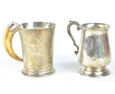 HARRISON BROS &amp; HOWSON; a George VI hallmarked silver baluster mug on stepped circular foot with leaf capped handle, Shef