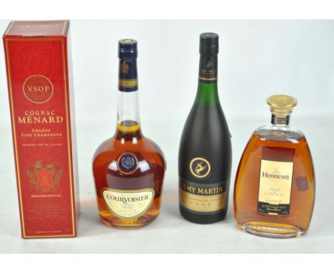 Four bottles of Cognac comprising Rémy Martin Fine Champagne V.S.O.P. 70cl 40%, Courvoisier V.S. 40% 1ltr, Menard Grande Fine