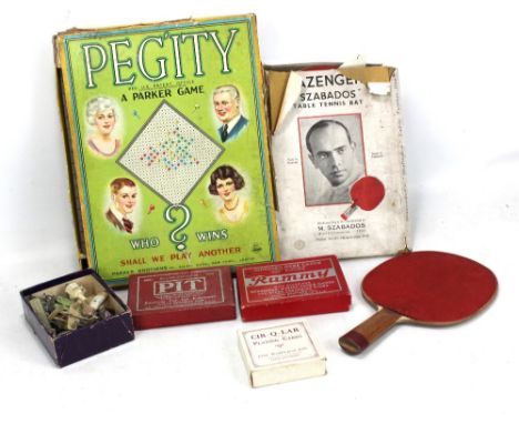 A boxed vintage Pegity board game by Parker Bros, boxed 'Rymmy' card, Cir-q-lar playing cards, a pair of Slazenger's 'Szabado