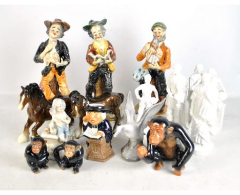 A group of ceramic figures to include two Beswick horses, three graduated Sylvac monkeys and three Capodimonte figures, heigh