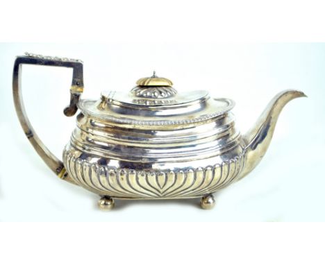 JE TERREY &amp; CO; a George IV hallmarked silver teapot of squat rectangular form, with ivory finial and insulators, flush h