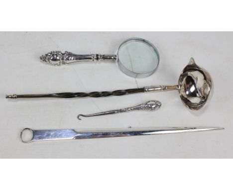 An Edward VII hallmarked silver handled chromed magnifying glass, maker's mark rubbed, Birmingham 1903, an electroplated bale