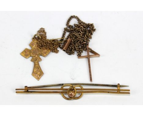 A 9ct rose gold cross pendant suspended on a 9ct kerb link chain, length 43cm, a further gold plated example on 9ct chain and