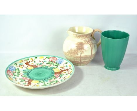 A Keith Murray for Wedgwood fluted vase, height 23.5cm (af), a large Radford jug and an HJ Wood Ltd Bursleigh mould decorated