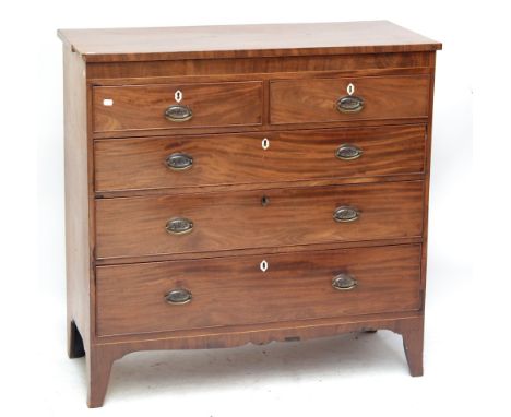 An early 19th century mahogany and boxwood strung chest of two short and three long graduated drawers raised on splayed brack