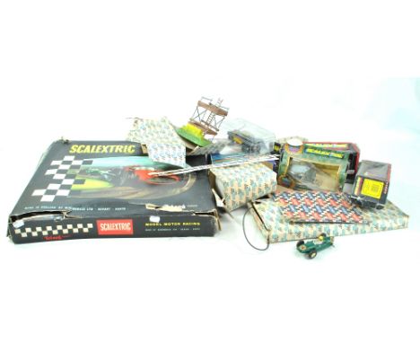 A group of Scalextric including Hornby and Tri-Ang G.P.3 set (part complete), boxed and loose cars, various trackside archite