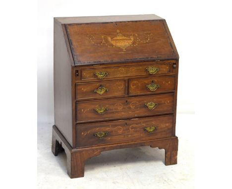 An Edwardian mahogany, inlaid and rosewood crossbanded bureau with fitted interior above arrangement of five short and long d