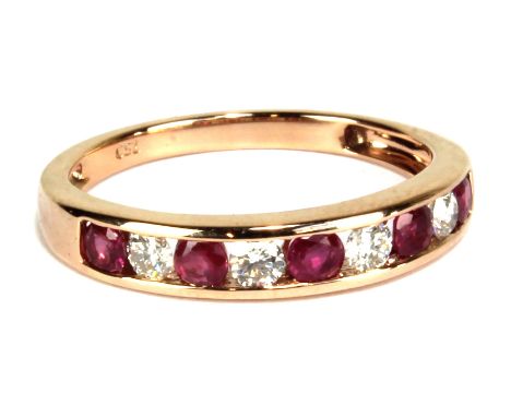 An 18ct rose gold ruby and diamond half eternity ring, size O, approx 3g.