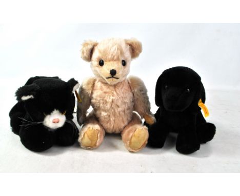 STEIFF; two modern Button in Ear cat and puppy soft toys, also a Past Times limited edition of 950 teddy bear (3). 