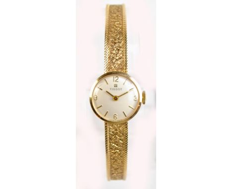 TISSOT; a lady's 9ct yellow gold mechanical cocktail watch, the circular dial set with Arabic and baton numerals, dial diamet