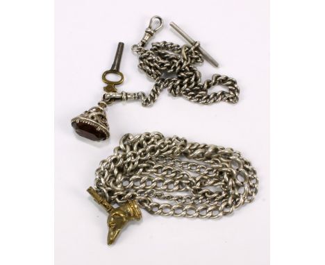 A hallmarked silver double Albert pocket watch chain suspending a novelty gilt base metal winding key modelled as the head of