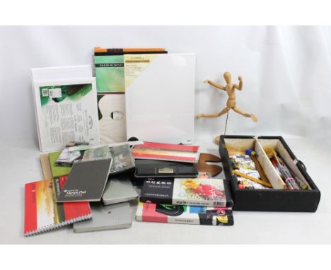 A quantity of variously new and used artist's supplies including sketchbooks, canvases, paints and paintbrushes etc, and a Ro