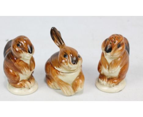 CLARICE CLIFF FOR WILKINSON POTTERY; a novelty three piece cruet set with each piece modelled as a rabbit, printed marks, hei