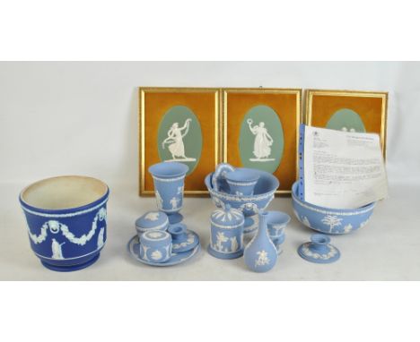 A group of Wedgwood jasperware including dark blue planter, three green oval plaques (all framed) and further light blue vase
