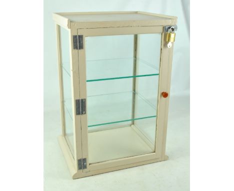 A glazed table top two shelf display cabinet, 56cm.