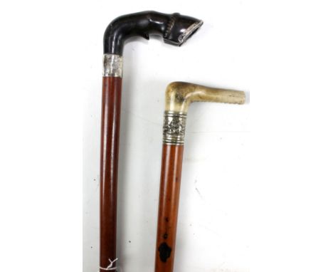 A Victorian malacca shafted hallmarked silver mounted walking stick with horn handle modelled as a horse's hoof, Chester 1899