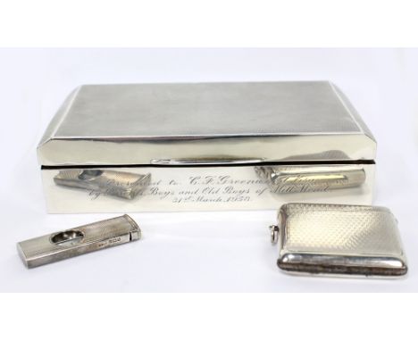 E J TREVITT &amp; SONS; a George VI hallmarked silver rectangular cigarette case with engine turned decorated hinged lid encl