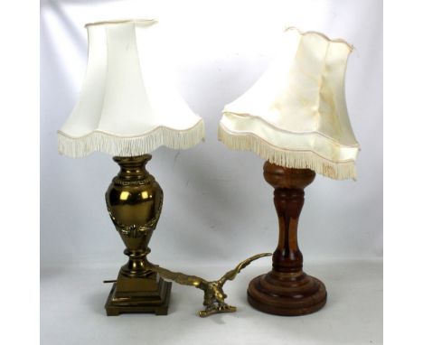 A brass table lamp of urn form on rectangular base, height excluding fitment approx 43cm, a wooden table lamp and a brass mod