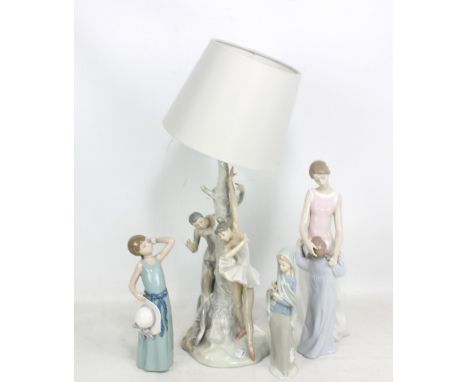 A Lladro harlequin and ballerina table lamp, height 44cm, a Lladro figure of mother and child, and two further Lladro figures