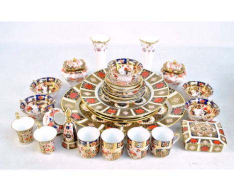 A group of Royal Crown Derby 'Old Imari' tableware including large oval platter, diameter 38cm, sandwich plates, cabinet plat