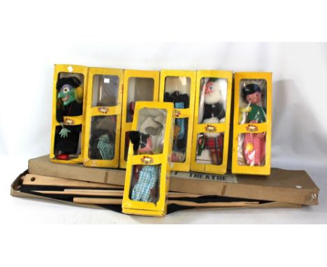 The Lightweight Pelham Puppet Theatre and seven puppets including Goofy, Macboozle, Witch, etc, all boxed (some boxes af). CO
