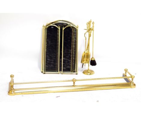 A quantity of fireplace furniture including fender, companion set, fire guards, etc.