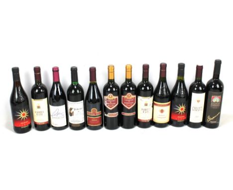 Twelve bottles of International varied vintage red wine including Giordano Sangiovese 2001, Selezione Paolo Masi Chianti 1998