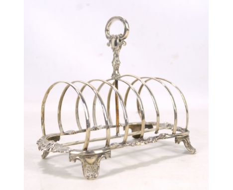 HENRY WILKINSON &amp; CO; a Victorian hallmarked silver six division toast rack with engraved monogram 'PD' beneath handle an