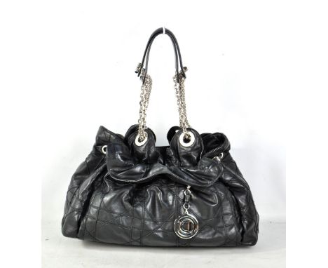 CHRISTIAN DIOR; a black Cannage Le Trent drawstring tote bag, with correct label numbered 17/B0-1029 and with Christian Dior 