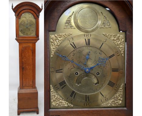 JOHN WOOD OF GRANTHAM; an oak cased eight day longcase clock, with brass arched dial, the chapter ring set with Roman and Ara