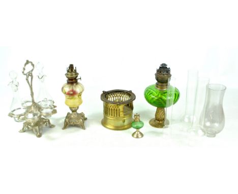 A French oil lamp, plated cruet set with associated jars, funnel, etc.