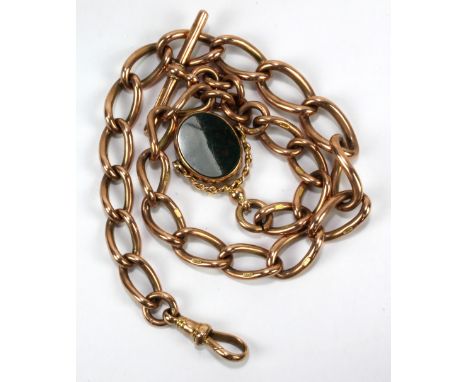 A 9ct rose gold pocket watch chain with T-bar, suspending a double sided bloodstone inset swivel seal, length 39cm, approx 74