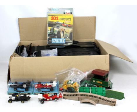 A group of Scalextric including two boxed and two loose cars, trackside accessories and quantity of track.