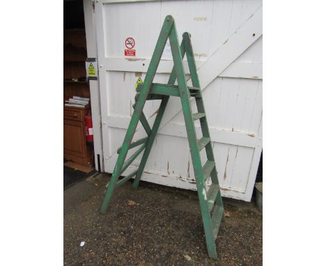 A wooden step ladder for display