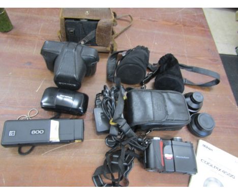 Nikon digital camera, Nikon Lenses, Kodak 60 and Brownie and an Olympus camera